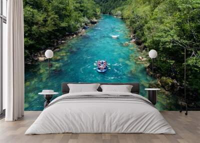  Rafting on the beautiful mountain river. Aerial view of rafting boat on amazing blue river Wall mural