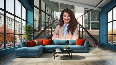 Portrait of confident cheerful businesswoman Wall mural