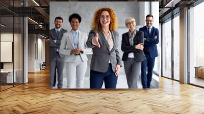 Portrait of multicultural business team standing in office together Wall mural