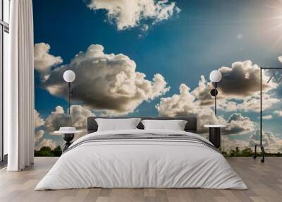 Bright midday sky with fluffy cumulus clouds Wall mural