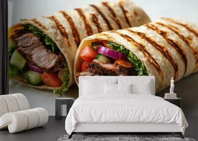 Two Grilled Tortillas Filled with Meat, Vegetables, and Lettuce Wall mural