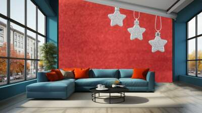 Silver star hang on red blur background 1 Wall mural