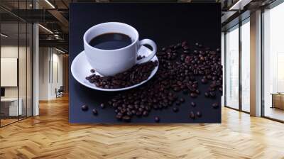 Hot coffee in the white cup and roasted on dark background
 Wall mural