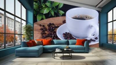 Hot coffee in the white cup and roasted on dark background
 Wall mural