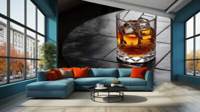 Whisky whiskey bourbon or cognac with ice cudes on black stone table Wall mural