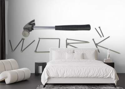 Hammer and the word work laid out of nails are isolated on a white background Wall mural