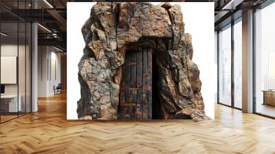 Old wooden door is blocking the entrance of a mysterious cave in a mountain Wall mural