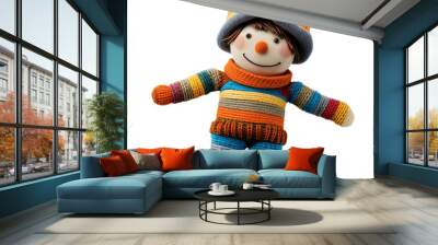 Smiling knitted rag doll wearing a colorful winter hat and sweater is posing on white background Wall mural