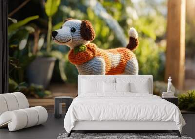 Handmade knitted or crocheted dog. Kid soft animal toy made yarn standing on wooden floor of terrace in green summer garden. Wall mural