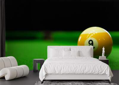 Close-up photos of billiard ball, number 9 and green floor Wall mural