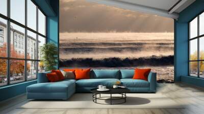 warm ocean water evaporates rapidly in extremely cold weather, producing fog. rare condensation phenomenon  Wall mural