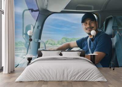 truck driver bearded man smiling fasten seat belt. Wall mural