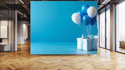 gift box with blue ribbon and balloons Wall mural