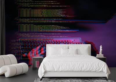 Hacker working with computer in dark room with digital interface around. Image with glitch effect. Wall mural