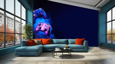 Levitation of two controller joysticks. Wall mural