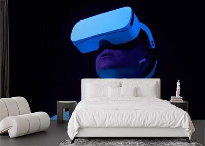 Man interting with virtual reality using vr headset. Wall mural