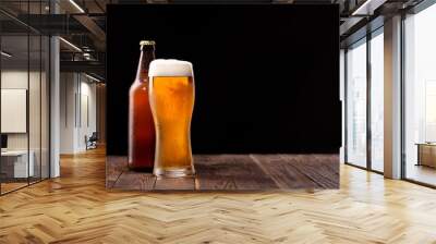 Photo of buttle and glass of beer Wall mural