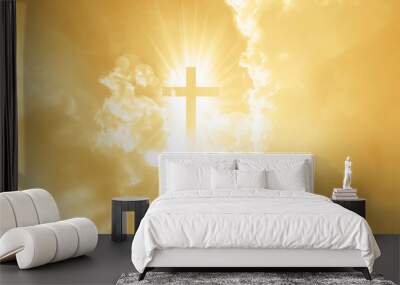 Christian cross appears bright in the yellow sky Wall mural