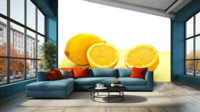 cut lemon with knife on white background Wall mural