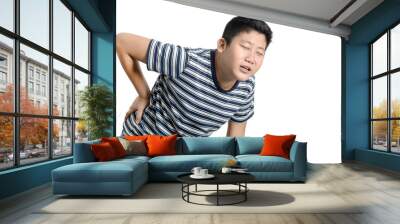 Young Asian preteen boy  having back pain. Wall mural