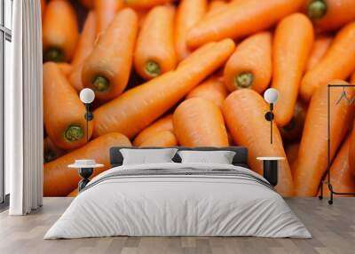 Beautiful ripe carrot background.Carrots in the supermarket. Wall mural