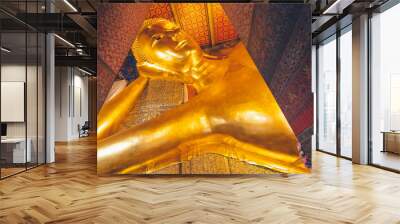 the image of gold reclining Buddha in capital palace wat pho temple bangkok thailand Wall mural