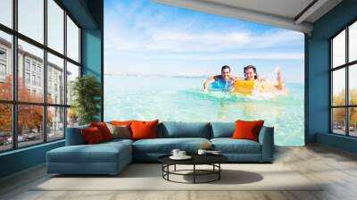 Young Couple With Pool Raft Wall mural