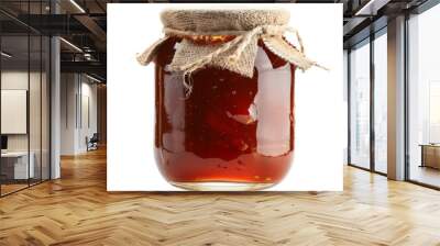 A glass jar filled with a thick, dark red liquid, topped with a burlap lid and tied with twine, isolated on a white background. Wall mural