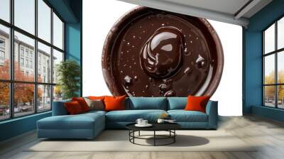 A small bowl of melted dark chocolate with a single, round chocolate piece in the center, set on a white background. Wall mural