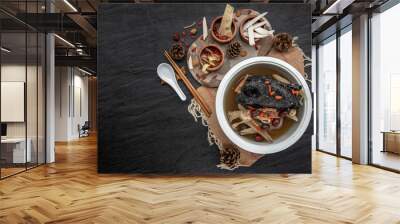 Chinese traditional nourishing health stew, stewed black bone chicken, Chinese black chicken soup, This soup very famous among chinese food and asian food as a healthy soup, food as medicine. Wall mural