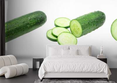 Flying cucumber has water drop with slices collection isolated  on white background. Wall mural