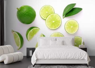 Lime with sliced and green leaf isolated on white background , top view , flat lay. Wall mural