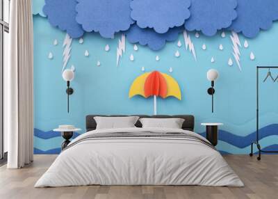 Raindrops with lightning on the sea and umbrella made of paper cut. Monsoon minimal paper art background. Wall mural