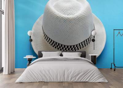 Vintage white hat fashion for summer on blue background. Wall mural