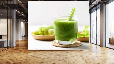 Celery green juice in glass on white background, Healthy drink for detox Wall mural