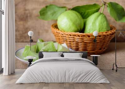 Fresh guava fruit on wooden background Wall mural