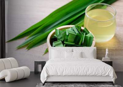 Sliced pandan leaf in a bowl and pandan drink, healthy drink in Asian Wall mural