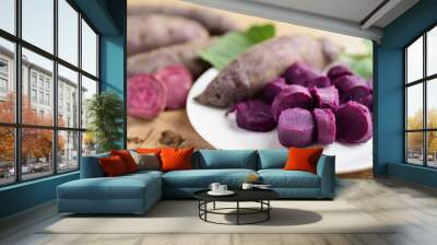 Sliced purple sweet potatoes on white plate, Healthy eating Wall mural