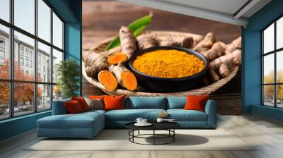 Turmeric powder and fresh turmeric (Curcuma, curcumin), Organic ingredient in Asian cuisine, food coloring or natural dyeing Wall mural