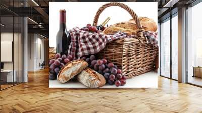 A rustic basket filled with fresh bread, grapes, and a bottle of wine, perfect for picnics and vineyard gatherings. Wall mural