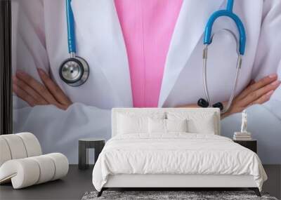 Routine healthcare checkup in a bright clinic, patient sitting on an exam table, healthcare  checkup, proactive health management Wall mural