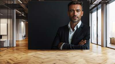 A half-body shot of a businessman feeling confident with a sleek black background, ample copy space Wall mural