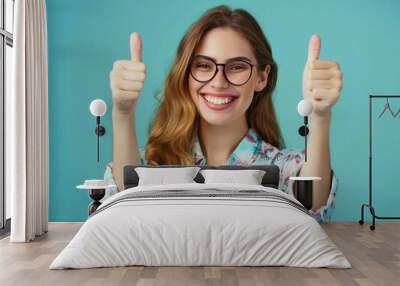 Photo of adorable confident lady dressed shirt showing two thumbs up isolated blue color background  Wall mural