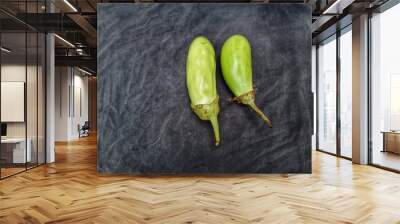 A group of vegetable eggplants on a black background. Vegetable eggplant black background Wall mural