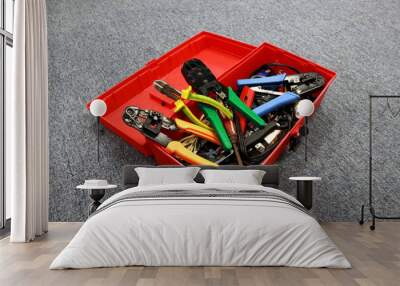 Photo of a red toolbox full of tools for workers Wall mural