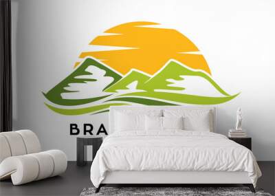 Green hills with sunrise vector logo Wall mural