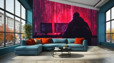 A hacker sits in front of a computer screen with a wall of red code behind them. Wall mural