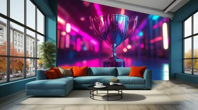 A shiny trophy sits on a reflective surface illuminated by vibrant pink and blue neon lights. Wall mural