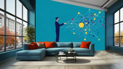 Connecting the dots: a man interacting with a complex network. Wall mural