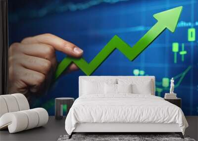 Financial growth concept, hand holding green arrow, blue background, detailed stock market graph for banners. Wall mural